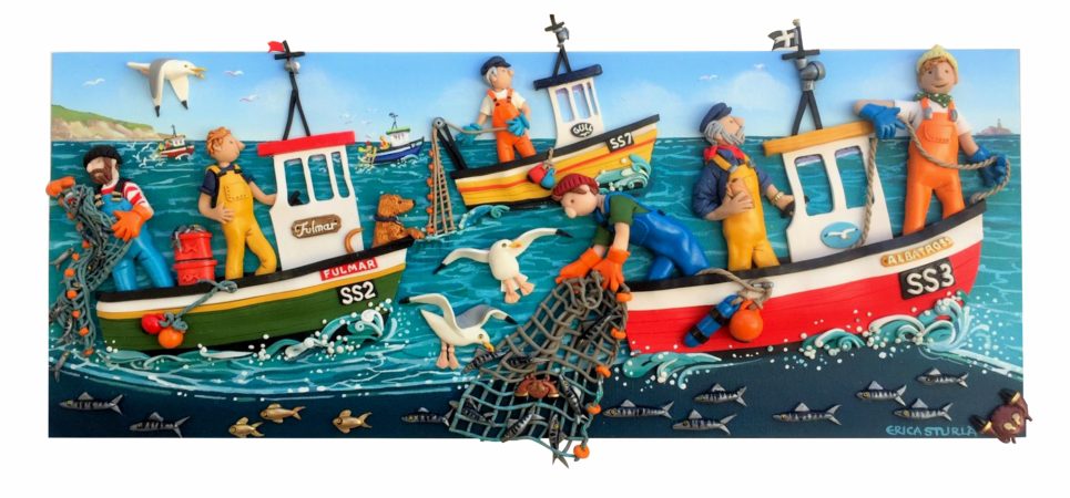Clay figures of six fisherman on three fishing boats at sea